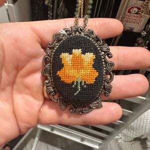 Vintage hand sewn necklace with pin on back